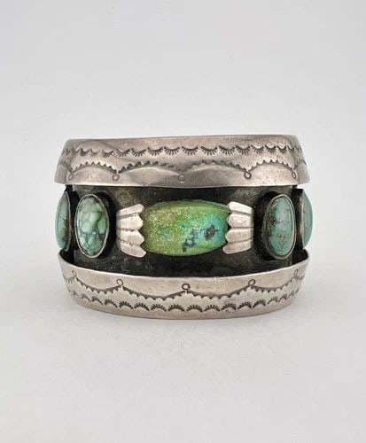 NAVAJO STERLING SILVER DAMELE TURQUOISE STAMPED SHADOWBOX CUFF BRACELET 90.8G: HUGE Navajo Sterling Silver Damele Turquoise Stamped Shadowbox Cuff Bracelet 90.8g Cuff is Tad Over 5" tip to Tip and has a 1 1/4" Wide Gap Cuff Is 1 5/8" Wide In the Center Weight is 90.8 Grams on my