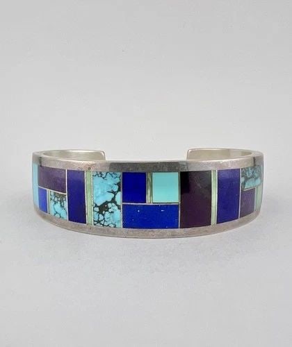 WAYNE ETSITTY STERLING SILVER NATURAL MULTI GEMSTONE FLUSH CUFF BRACELET 44G: WAYNE ETSITTY STERLING SILVER NATURAL MULTI GEMSTONE FLUSH CUFF BRACELET 44G Vtg Wayne Etsitty Sterling Silver Natural Multi Gemstone Flush Cuff Bracelet 44g Cuff is 5 3/8" tip to Tip and has a 1 1/8"