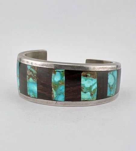 VTG NAVAJO STERLING SILVER ROYSTON TURQUOISE & IRONWOOD FLUSH CUFF BRACELET 73G: Vtg Navajo Sterling Silver Royston Turquoise & Ironwood Flush Row Cuff Bracelet 73g Cuff is Just Under 5" tip to Tip and has a 1 1/8" Wide Gap Cuff Is Graduated From 1 1/8" to Just Under 3/4" Wide Tot
