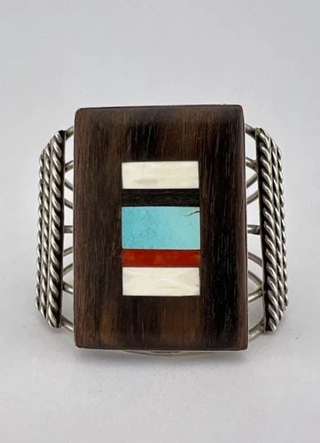 VTG NAVAJO STERLING SILVER WOOD TURQUOISE CORAL FLUSH INLAY WIDE CUFF BRACELET: VTG NAVAJO STERLING SILVER WOOD TURQUOISE CORAL FLUSH INLAY WIDE CUFF BRACELET Vtg Navajo Sterling Silver Wood Turquoise Coral Flush Inlay WIDE Cuff Bracelet Cuff is 5 3/8" tip to Tip and has a 1 1/4"
