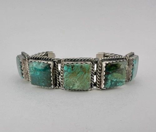 VTG NAVAJO STERLING SILVER NATURAL SPIDERWEB TURQUOISE TWIST CUFF BRACELET 59.5G: Vtg Navajo Sterling Silver Natural Spiderweb Turquoise Twist Cuff Bracelet 59.5g Cuff is 5 5/8" tip to Tip and has an Around 1 3/8" Wide Slightly Adjustable Gap Cuff Is 3/4" Wide In the Center Weight 