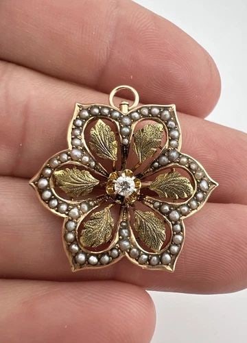 VICTORIAN 10K GOLD EUROPEAN CUT DIAMOND & SEED PEARL FLOWER SUN PIN PENDANT: VICTORIAN 10K GOLD EUROPEAN CUT DIAMOND & SEED PEARL FLOWER SUN PIN PENDANT Victorian 10k Gold European Cut Diamond & Seed Pearl Flower Sun Pin Pendant Size: 1" Tall By 1 1/8" Wide Weight: 4.3 Grams o