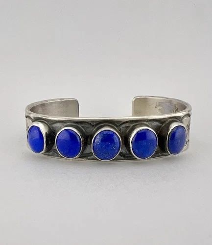 CHIMNEY BUTTE + JUAN G NAVAJO STERLING SILVER LAPIS LAZULI STAMPED CUFF BRACELET: CHIMNEY BUTTE + JUAN G NAVAJO STERLING SILVER LAPIS LAZULI STAMPED CUFF BRACELET Chimney Butte Navajo Sterling Silver Lapis Lazuli Stamped Cuff Bracelet 81.9g Cuff is 6 1/8" tip to Tip and has a Just 