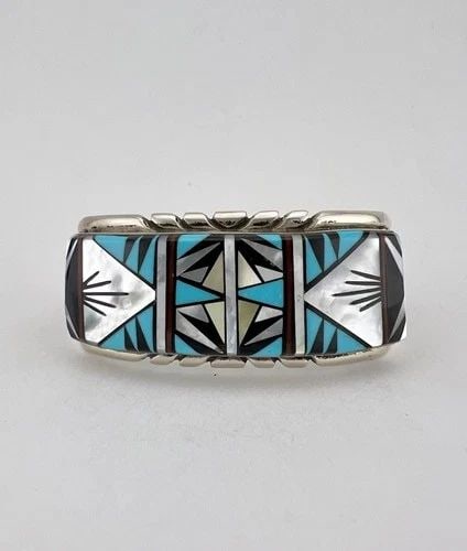 VINTAGE T&J NAVAJO STERLING SILVER MULTI GEMSTONE FLUSH CUFF BRACELET 48.2G: VINTAGE T&J NAVAJO STERLING SILVER MULTI GEMSTONE FLUSH CUFF BRACELET 48.2G Vintage T&J Navajo Sterling Silver Multi Gemstone Flush Cuff Bracelet 48.2g Cuff Size is 5 3/8" tip to Tip and has a 1" Wide