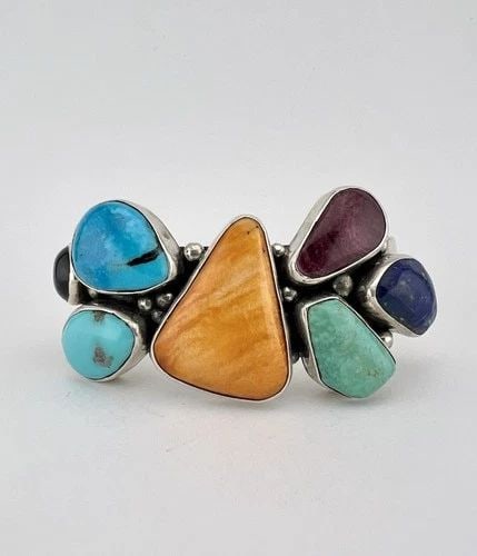 CHIMNEY BUTTE NAVAJO STERLING SILVER MULTI GEMSTONE CUFF BRACELET 62.4G: CHIMNEY BUTTE NAVAJO STERLING SILVER MULTI GEMSTONE CUFF BRACELET 62.4G Chimney Butte Navajo Sterling Silver Multi Gemstone Cuff Bracelet 62.4g Cuff is 5" tip to Tip and has an 1 1/2" Wide Slightly Ad