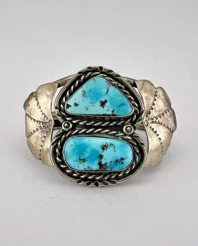VTG RS NAVAJO STERLING SILVER HIGH GRADE MORENCI TURQUOISE STAMPED CUFF BRACELET: Vtg RS Navajo Sterling Silver High Grade Morenci Turquoise Stamped Cuff Bracelet Cuff is 5 1/2" tip to Tip and has a 1 1/8" Wide Adjustable Gap Cuff Is 1 3/4" Wide In the Center Weight is 44.8 Grams o