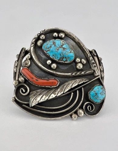 VTG NAVAJO STERLING SILVER TURQUOISE & CORAL STAMPED WIDE CUFF BRACELET 84.3G: VTG NAVAJO STERLING SILVER TURQUOISE & CORAL STAMPED WIDE CUFF BRACELET 84.3G Vtg Navajo Sterling Silver Turquoise & Coral Stamped Wide Cuff Bracelet 84.3g Cuff is 5 1/2" tip to Tip and has an 1 1/8" 