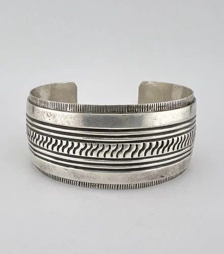HUGE VTG MIKE BEGAY NAVAJO STERLING SILVER DEEP STAMPED WIDE CUFF BRACELET 54G: HUGE VTG MIKE BEGAY NAVAJO STERLING SILVER DEEP STAMPED WIDE CUFF BRACELET 54G HUGE Vtg Mike Begay Navajo Sterling Silver Deep Stamped Wide Cuff Bracelet 54g Cuff is 5 3/4" Tip to Tip and has a 1 1/8"