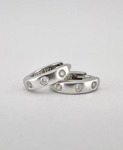 14K WHITE GOLD .06TCW NATURAL DIAMOND HUGGIE HUGGIES 1/2" HOOP POST EARRINGS: 14K WHITE GOLD .06TCW NATURAL DIAMOND HUGGIE HUGGIES 1/2" HOOP POST EARRINGS Designer 14K White Gold .06tcw Natural Diamond Huggie Huggies 1/2" Hoop Post Earrings Size: Around 1/2" Tall & Face Of The 