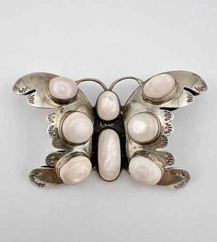 HUGE VTG NAVAJO STERLING SILVER MOTHER OF PEARL BUTTERFLY STAMPED PENDANT 3 3/8": HUGE Vtg Navajo Sterling Silver Mother of Pearl Butterfly Stamped Pendant 3 3/8" Size: Over 2" Tall & 3 3/8" Wide & 5/8" Deep Metal: Sterling Silver Weight is 42.5 Grams on my scale Amazing Natural Li
