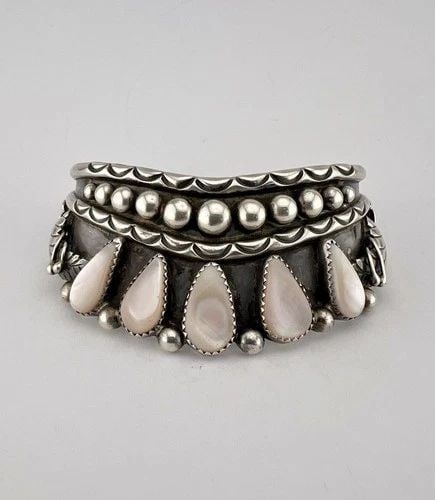 VTG RAYNA PLATERO SECATERO NAVAJO STERLING SILVER MOTHER OF PEARL CUFF BRACELET: Vtg Rayna Platero Secatero Navajo Sterling Silver Mother Of Pearl Cuff Bracelet Cuff is Just Over 5 1/2" tip to Tip and has a 1" Wide Adjustable Gap Cuff Is Just Under 1 1/4" Wide In the Center Weight