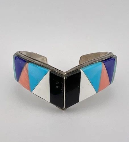 VINTAGE NAVAJO STERLING SILVER MULTI GEMSTONE FLUSH INLAY CUFF BRACELET 62.5G: VINTAGE NAVAJO STERLING SILVER MULTI GEMSTONE FLUSH INLAY CUFF BRACELET 62.5G Vintage Navajo Sterling Silver Multi Gemstone Flush Inlay Cuff Bracelet 62.5g Cuff is 5 1/2" tip to Tip and has a Around 1