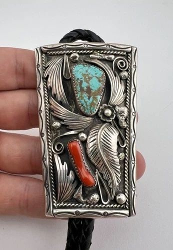 HUGE 3" VTG NAVAJO STERLING SILVER KINGMAN TURQUOISE & CORAL STAMPED BOLO TIE: HUGE 3" Vtg Navajo Sterling Silver Kingman Turquoise & Coral Stamped Bolo Tie Size: 3" Tall by 2" Wide At The Top Weight is 63.4 Grams on my scale Metal: Sterling Silver Amazing Natural Webbed Kingman