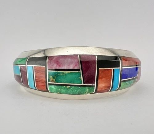 VTG GILBERT NELSON NAVAJO STERLING SILVER MULTI GEM FLUSH CUFF BRACELET 56.5G: VTG GILBERT NELSON NAVAJO STERLING SILVER MULTI GEM FLUSH CUFF BRACELET 56.5G Vtg Gilbert Nelson Navajo Sterling Silver Multi Gem Flush Cuff Bracelet 56.5g Cuff is 5 1/2" tip to Tip and has a 1 1/8" W
