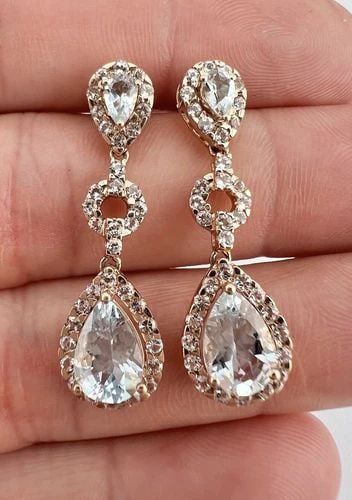 DESIGNER 10K ROSE GOLD BLUE & WHITE TOPAZ HALO DANGLE POST EARRINGS 1.25": DESIGNER 10K ROSE GOLD BLUE & WHITE TOPAZ HALO DANGLE POST EARRINGS 1.25" Designer 10k Rose Gold Blue & White Topaz Halo Dangle Post Earrings 1.25" Size: Slightly Over 1 1/4" Tall & 3/8" Wide At The B