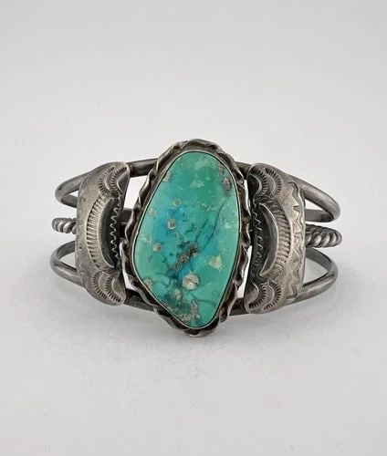 OLD PAWN NAVAJO STERLING SILVER CERRILLOS TURQUOISE STAMPED TWIST CUFF BRACELET: Old Pawn Navajo Sterling Silver Cerrillos Turquoise Stamped Twist Cuff Bracelet Cuff is 5 5/8" tip to Tip and has a Just Under 1 1/8" Wide Adjustable Gap Cuff Is 1 3/8" Wide In the Center Weight is 38
