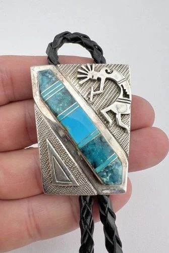 VINTAGE NAVAJO STERLING SILVER TURQUOISE INLAY KOKOPELLI STAMPED BOLO TIE 48.9G: VINTAGE NAVAJO STERLING SILVER TURQUOISE INLAY KOKOPELLI STAMPED BOLO TIE 48.9G Vintage Navajo Sterling Silver Turquoise Inlay Kokopelli Stamped Bolo Tie 48.9g Size: Just Under 2" Tall By 1 5/8" Wide 