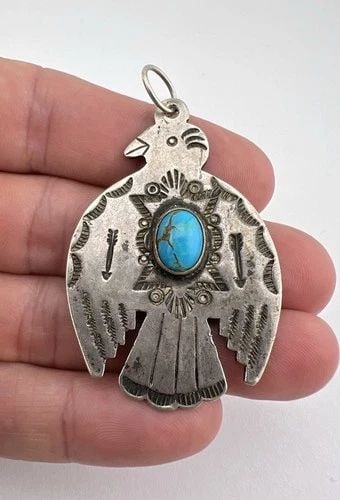 VTG FRED HARVEY ERA NAVAJO STERLING SILVER TURQUOISE STAMPED THUNDERBIRD PENDANT: Vtg Fred Harvey Era Navajo Sterling Silver Turquoise Stamped Thunderbird Pendant Size: 1 3/8" Wide By Just Under 2 1/2" Tall With Bail Metal: Sterling Silver Weight is 12.9 Grams on my scale In Great 