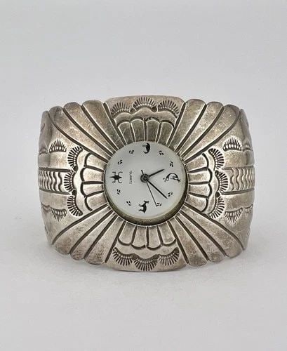 JERRY NELSON NAVAJO STERLING SILVER STAMPED WOMEN'S WIDE CUFF WATCH BRACELET 63G: Vintage Jerry Nelson Navajo Sterling Silver Stamped Women's WIDE Cuff Watch Bracelet 63g Cuff is Around 5 1/4" tip to Tip and has an 3/4" Wide - Adjustable Gap Cuff Is 1 5/8" at Its Widest Point Weigh