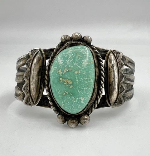 FRED HARVEY NAVAJO STERLING SILVER CARICO LAKE TURQUOISE STAMPED CUFF BRACELET: FRED HARVEY NAVAJO STERLING SILVER CARICO LAKE TURQUOISE STAMPED CUFF BRACELET Fred Harvey Navajo Sterling Silver Carico Lake Turquoise Stamped Cuff Bracelet Cuff is 5 1/4" tip to Tip and has a 1" Adj