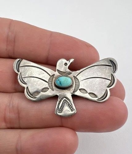 OLD 1940'S NAVAJO STERLING SILVER TURQUOISE STAMPED THUNDERBIRD BROOCH PENDANT: Old 1940's Navajo Sterling Silver Turquoise Stamped Thunderbird Brooch Pendant Size: About 2" Wide By 1 1/4" Tall Metal: Sterling Silver / Coin Silver Weight is 7.0 Grams on my scale Can Be Worn as A 