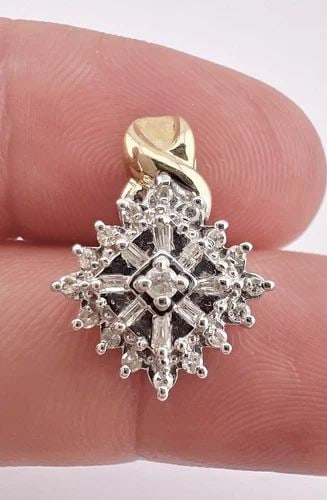 DESIGNER 10K YELLOW & WHITE GOLD ROUND & BAGUETTE DIAMOND HALO DANGLE PENDANT: DESIGNER 10K YELLOW & WHITE GOLD ROUND & BAGUETTE DIAMOND HALO DANGLE PENDANT Designer 10K Yellow & White Gold Round & Baguette Diamond Halo Dangle Pendant Size: 3/4" Tall With Bail By 5/8" Wide Metal