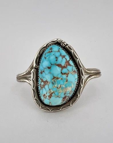 VTG SK NAVAJO NATURAL INDIAN MOUNTAIN TURQUOISE STERLING SILVER CUFF BRACELET: VTG SK NAVAJO NATURAL INDIAN MOUNTAIN TURQUOISE STERLING SILVER CUFF BRACELET Vtg SK Navajo Natural Indian Mountain Turquoise Sterling Silver Cuff Bracelet Cuff is Slightly Over 4 3/4" tip to Tip and 