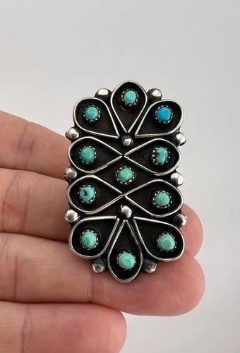 HUGE OLD ZUNI STERLING SILVER PETIT POINT SNAKE EYE TURQUOISE WOMEN'S RING 2": HUGE Old Zuni Sterling Silver Petit Point Snake Eye Turquoise Women's Ring 2" Ring Size: 6 - Can Be re Sized Weight is 17.1 Grams on my scale Metal: Sterling Silver Ring is 2" Tall In the Center By 1 
