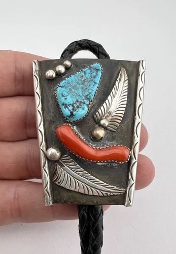 GIBSON MONTANO NAVAJO STERLING SILVER KINGMAN TURQUOISE & CORAL BOLO TIE 2.25": Vintage Gibson Montano Navajo Sterling Silver Kingman Turquoise & Coral Bolo Tie 2.25" Size: 2 1/4" Tall by 2" Wide At The Top Weight is 44.4 Grams on my scale Metal: Sterling Silver Amazing Natural B
