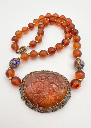 OLD CHINESE GILT SILVER CARVED HONEY COGNAC BALTIC AMBER PLAQUE ENAMEL NECKLACE: OLD CHINESE GILT SILVER CARVED HONEY COGNAC BALTIC AMBER PLAQUE ENAMEL NECKLACE Old Chinese Gilt Silver Carved Honey Cognac Baltic Amber Plaque Enamel Necklace Necklace Size: 21.5" Long Pendant Size: 