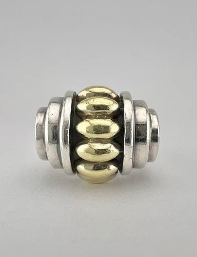 LAGOS STERLING SILVER & 18K YELLOW GOLD CAVIAR RING: LAGOS STERLING SILVER & 18K YELLOW GOLD CAVIAR RING LAGOS Sterling Silver & 18K Yellow Gold Caviar Ring Ring Size: 5.5 - Can Be Resized Metal: Sterling Silver & 18k Yellow gold Weight is 13.3 Grams on
