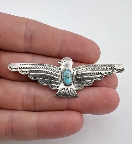 1940'S NAVAJO STERLING SILVER TURQUOISE STAMPED THUNDERBIRD PIN BROOCH 2 5/8": 1940's Navajo Sterling Silver Turquoise Stamped Thunderbird Pin Brooch 2 5/8" Size: 2 5/8" Wide By 1" Tall Metal: Sterling Silver Weight is 6.5 Grams on my scale In Great Antique Condition, Any Questi