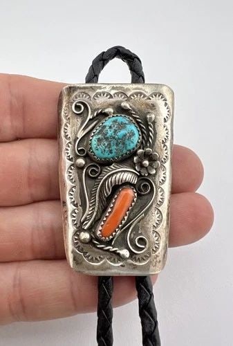 VTG NAVAJO STERLING SILVER KINGMAN TURQUOISE & RED CORAL STAMPED BOLO TIE 2 1/8": VTG NAVAJO STERLING SILVER KINGMAN TURQUOISE & RED CORAL STAMPED BOLO TIE 2 1/8" Vtg Navajo Sterling Silver Kingman Turquoise & Red Coral Stamped Bolo Tie 2 1/8" Size: 2 1/8" Tall by Over 1 1/4" Wide 