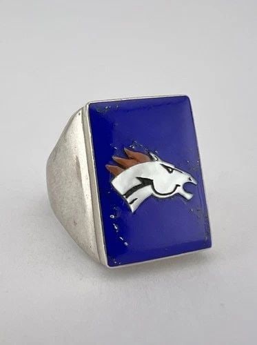 VTG BOBBY CONCHO ZUNI MULTI-INLAY STERLING SILVER DENVER BRONCOS FOOTBALL RING: VTG BOBBY CONCHO ZUNI MULTI-INLAY STERLING SILVER DENVER BRONCOS FOOTBALL RING Vtg Bobby Concho Zuni Multi-Inlay Sterling Silver Denver Broncos Football Ring Ring Size: 10.5 - Can Be Re Sized Weight i