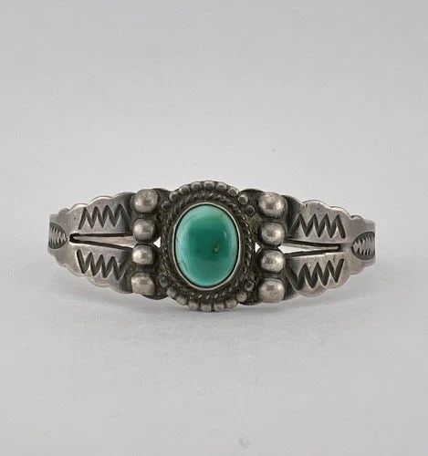 VTG FRED HARVEY NAVAJO STERLING SILVER CERRILLOS TURQUOISE STAMPED CUFF BRACELET: Vtg Fred Harvey Navajo Sterling Silver Cerrillos Turquoise Stamped Cuff Bracelet Cuff is 5 1/2" tip to Tip and has a 1 1/8" Wide Adjustable Gap Cuff Is 3/4" Wide In the Center Weight is 20.0 Grams on 