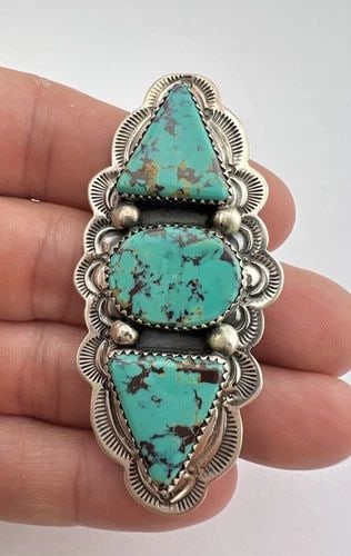 VTG NAVAJO STERLING SILVER KINGMAN TURQUOISE STAMPED PIN PENDANT 2 5/8": VTG NAVAJO STERLING SILVER KINGMAN TURQUOISE STAMPED PIN PENDANT 2 5/8" Vtg Navajo Sterling Silver Kingman Turquoise Stamped Pin Pendant 2 5/8" Size: 2 5/8" Tall by 1 1/4" Wide Weight is 25.9 Grams on