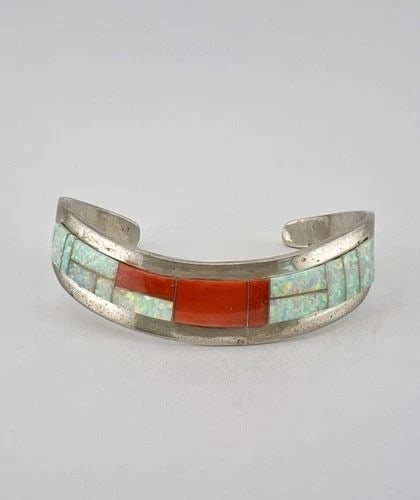 VINTAGE J. NELSON NAVAJO STERLING SILVER RED CORAL & FIRE OPAL CUFF BRACELET: VINTAGE J. NELSON NAVAJO STERLING SILVER RED CORAL & FIRE OPAL CUFF BRACELET Vintage J. Nelson Navajo Sterling Silver Red Coral & Fire Opal Cuff Bracelet Cuff Size is 5" tip to Tip and has an 1 1/4" W