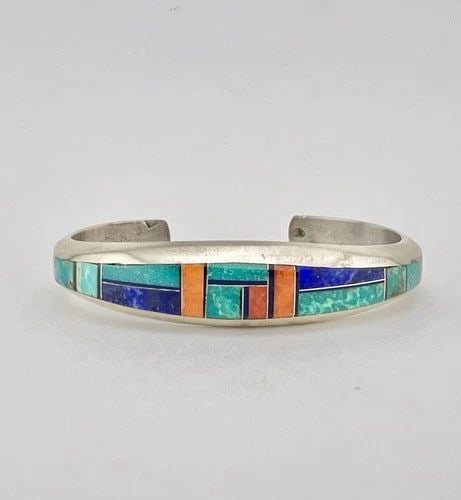 PHILLIP SANCHEZ NAVAJO STERLING SILVER MULTI GEMSTONE FLUSH CUFF BRACELET #1: PHILLIP SANCHEZ NAVAJO STERLING SILVER MULTI GEMSTONE FLUSH CUFF BRACELET #1 Vtg Phillip Sanchez Navajo Sterling Silver Multi Gemstone Flush Cuff Bracelet #1 Cuff is 5 3/8" tip to Tip and has a 1 1/8"