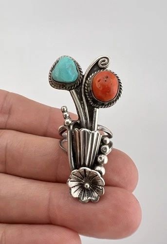 VTG NAVAJO STERLING SILVER TURQUOISE & CORAL DETAILED STAMPED FLORAL RING 1 7/8": Vtg Navajo Sterling Silver Turquoise & Coral Detailed Stamped Floral Ring 1 7/8" Ring Size: 6.5 - Can Be Re Sized Weight is 12.6 Grams on my scale Metal: Sterling Silver Ring is 1 7/8" Tall In the Cen