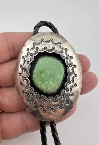 VTG NAVAJO STERLING SILVER BLUE GEM TURQUOISE STAMPED SHADOWBOX BOLO TIE 2 3/8": VTG NAVAJO STERLING SILVER BLUE GEM TURQUOISE STAMPED SHADOWBOX BOLO TIE 2 3/8" Vtg Navajo Sterling Silver Blue Gem Turquoise Stamped Shadowbox Bolo Tie 2 3/8" Size: 2 3/8" Tall by 1 3/4" Wide Weight 