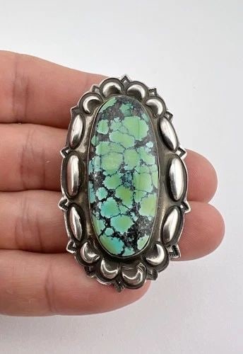 VTG M. VILLANUEVA NAVAJO STERLING SILVER SPIDERWEB TURQUOISE STAMPED PIN PENDANT: VTG M. VILLANUEVA NAVAJO STERLING SILVER SPIDERWEB TURQUOISE STAMPED PIN PENDANT Vtg M. Villanueva Navajo Sterling Silver Spiderweb Turquoise Stamped Pin Pendant Size: 2 1/8" Tall by 1 1/4" Wide Metal