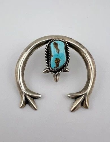 VINTAGE NAVAJO SANDCAST STERLING SILVER BLUE GEM TURQUOISE NAJA PENDANT 2": Vintage Navajo Sandcast Sterling Silver Blue Gem Turquoise NAJA Pendant 2" Size: 1 7/8" Tall By 2" Wide Metal: Sterling Silver Weight is 20.4 Grams on my scale Amazing Natural Blue Gem Turquoise Gemst