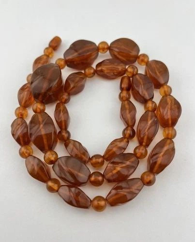 VINTAGE NATURAL BALTIC COGNAC CARVED HONEY AMBER NECKLACE 28.25" - 63G: VINTAGE NATURAL BALTIC COGNAC CARVED HONEY AMBER NECKLACE 28.25" - 63G Vintage Natural Baltic Cognac Carved Honey Amber Necklace 28.25" - 63g Size: 28 1/4" Long Round Beads Size: Over 8mm Wide Carved 