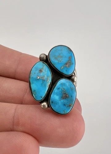 OLD PAWN NAVAJO STERLING SILVER HIGH GRADE MORENCI TURQUOISE WOMEN'S RING: Old Pawn Navajo Sterling Silver High Grade Morenci Turquoise Women's Ring Ring Size: 7 - Can Be Resized Weight is 11.4 Grams on my scale Test Positive For Sterling Silver Ring is 1 1/8" Tall In the Ce