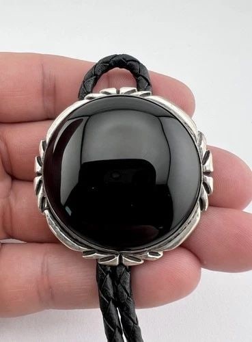 VINTAGE HP NAVAJO STERLING SILVER BLACK ONYX STAMPED ROUND BOLO TIE 1.75": VINTAGE HP NAVAJO STERLING SILVER BLACK ONYX STAMPED ROUND BOLO TIE 1.75" Vintage HP Navajo Sterling Silver Black Onyx Stamped Round Bolo Tie 1.75" Size: 1 3/4" Tall & Wide Weight is 47.5 Grams on my 