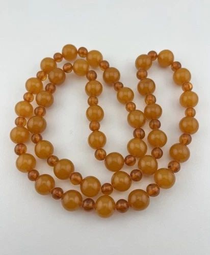 VINTAGE NATURAL BALTIC COGNAC HONEY AMBER ROUND BALL NECKLACE 32" - 64.8G: VINTAGE NATURAL BALTIC COGNAC HONEY AMBER ROUND BALL NECKLACE 32" - 64.8G Vintage Natural Baltic Cognac Honey Amber Round Ball Necklace 32" - 64.8g Size: 32" Long - No Clasp Weight is 64.8 Grams on my
