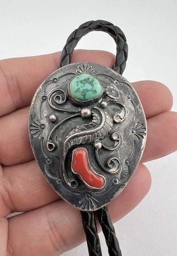 VINTAGE NAVAJO STERLING SILVER TURQUOISE & CORAL STAMPED BOLO TIE 2 1/8": VINTAGE NAVAJO STERLING SILVER TURQUOISE & CORAL STAMPED BOLO TIE 2 1/8" Vintage Navajo Sterling Silver Turquoise & Coral Stamped Bolo Tie 2 1/8" Size: 2 1/8" Tall by 1 5/8" Wide Weight is 36.0 Grams 