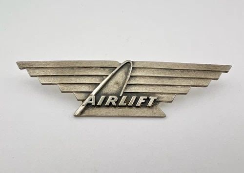 RARE AIRLIFT INTERNATIONAL AIRLINES PILOT STERLING SILVER WINGS 3 1/4": Rare Airlift International Airlines Pilot Sterling Silver Wings 3 1/4" Size: 3 1/4" Wide By 7/8" Tall Metal: Sterling Silver Weight is 15.8 Grams on my scale In Great Condition, any questions please F