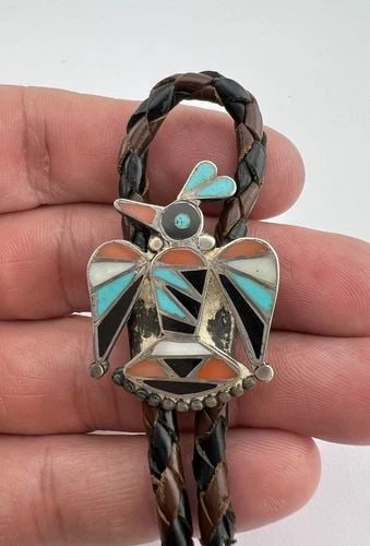 EARLY 1940S FRANK VACIT ZUNI STERLING SILVER MULTI GEMSTONE THUNDERBIRD BOLO TIE: EARLY 1940S FRANK VACIT ZUNI STERLING SILVER MULTI GEMSTONE THUNDERBIRD BOLO TIE Early 1940s Frank Vacit Zuni Sterling Silver Multi Gemstone Thunderbird Bolo Tie Size: 1 3/8" Tall by 1 1/8" Wide Weigh