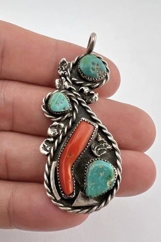 VINTAGE NAVAJO STERLING SILVER HIGH GRADE BLUE TURQUOISE & CORAL PENDANT 2.25": Vintage Navajo Sterling Silver High Grade Blue Turquoise & Coral Pendant 2.25" Size: 2 1/4" Tall With bail by 1" Wide Weight is 11.2 Grams on my scale Test Positive For Sterling Silver Amazing Natural